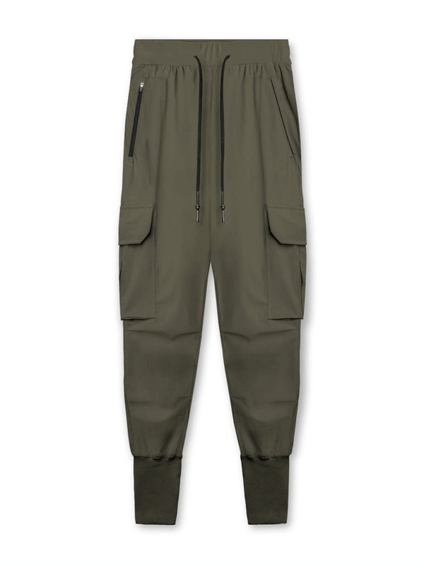 Olive green loose slim elastic joggers pants for men with wide cuffs and drawstring closure, ideal for running and workouts.
